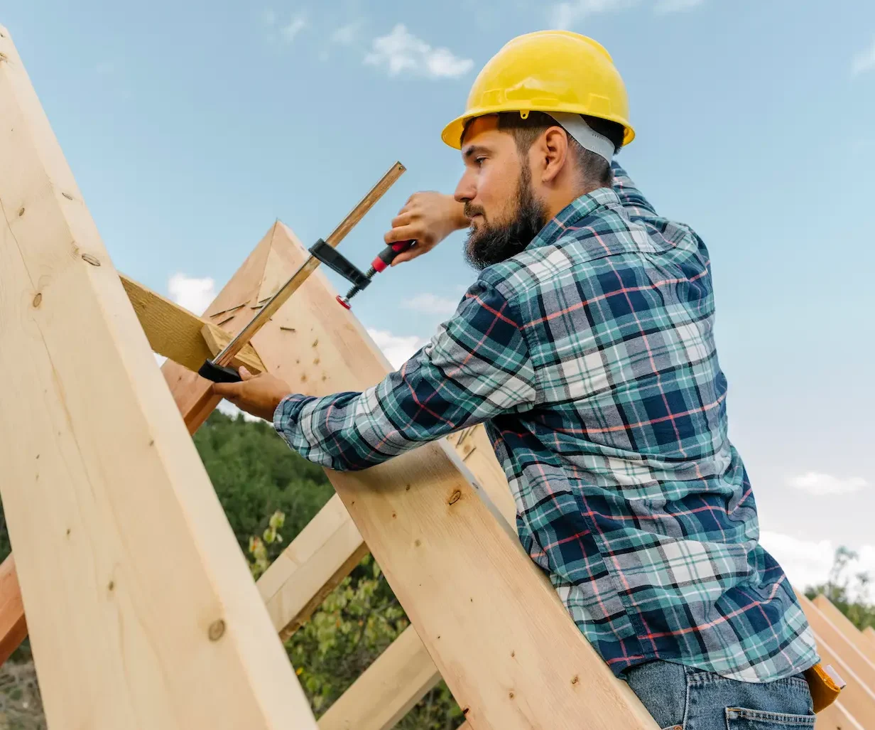 worker-with-hard-hat-building-roof-house